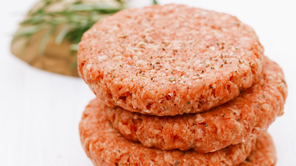 Raw burgers for hamburgers