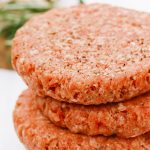 Raw burgers for hamburgers